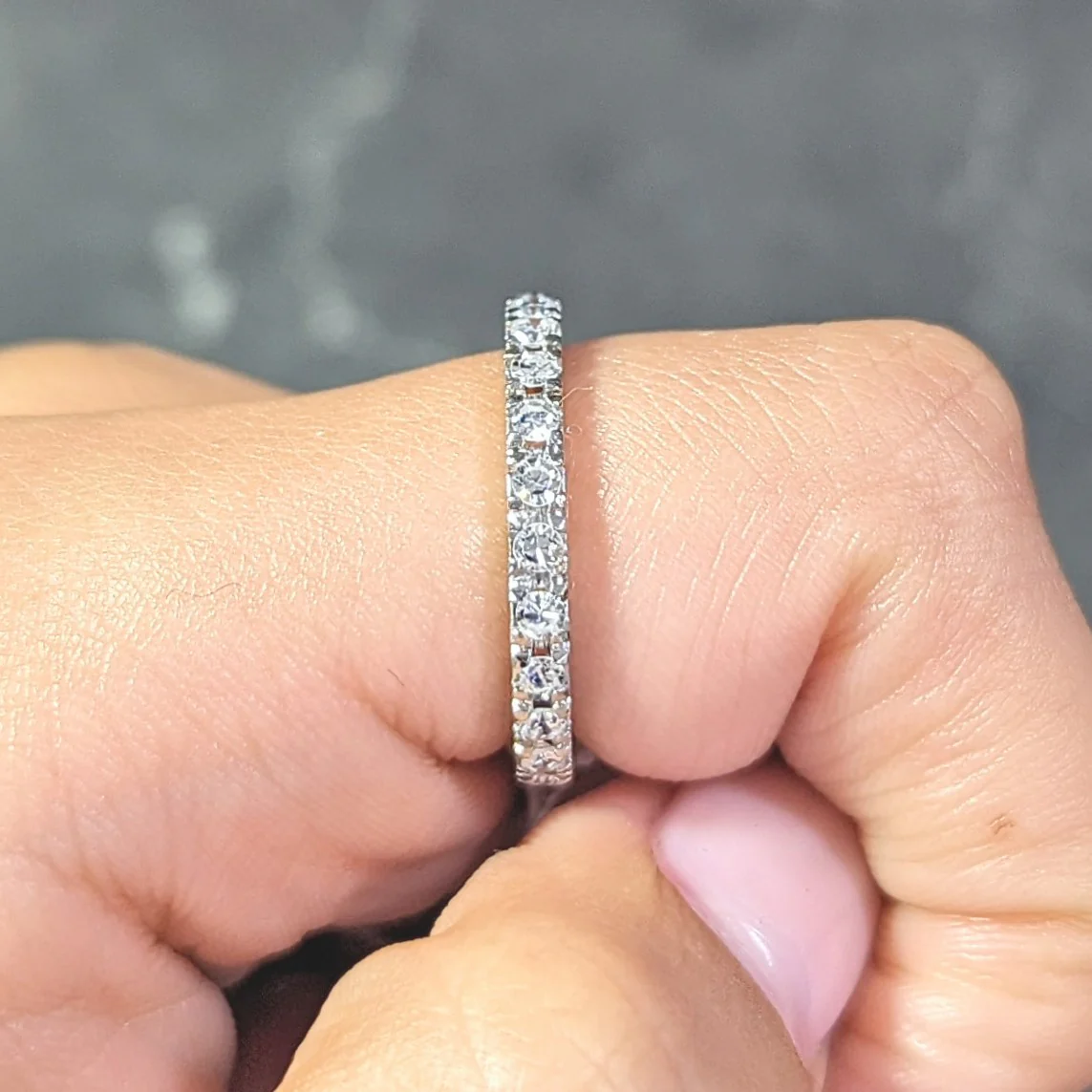 Contemporary 0.72 CTW Diamond Platinum Scrolling Dollar Sign Eternity Band Ring - Image 11