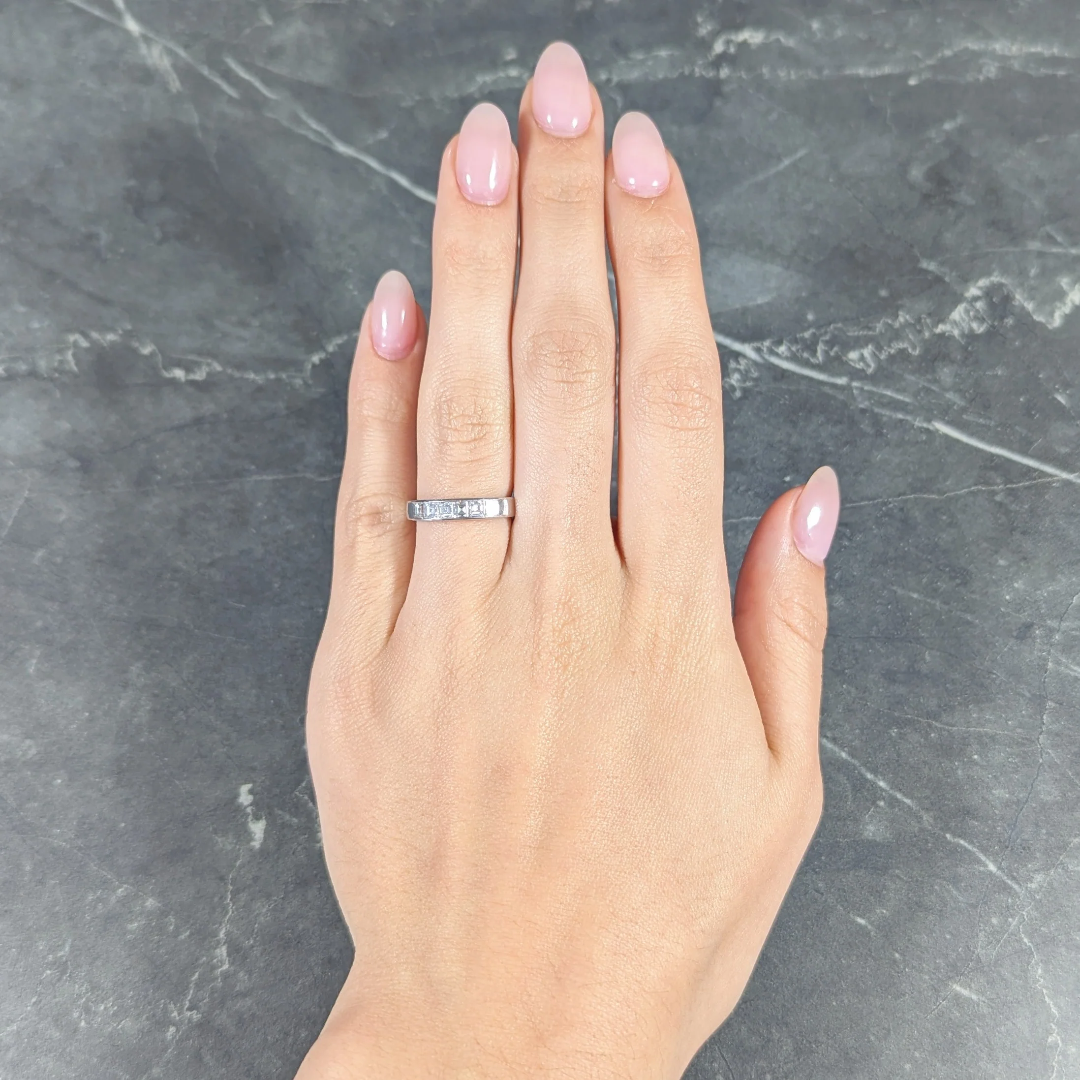 Contemporary 0.72 CTW Square Step Cut Diamond Platinum Five Stone Channel Band Ring - Image 10