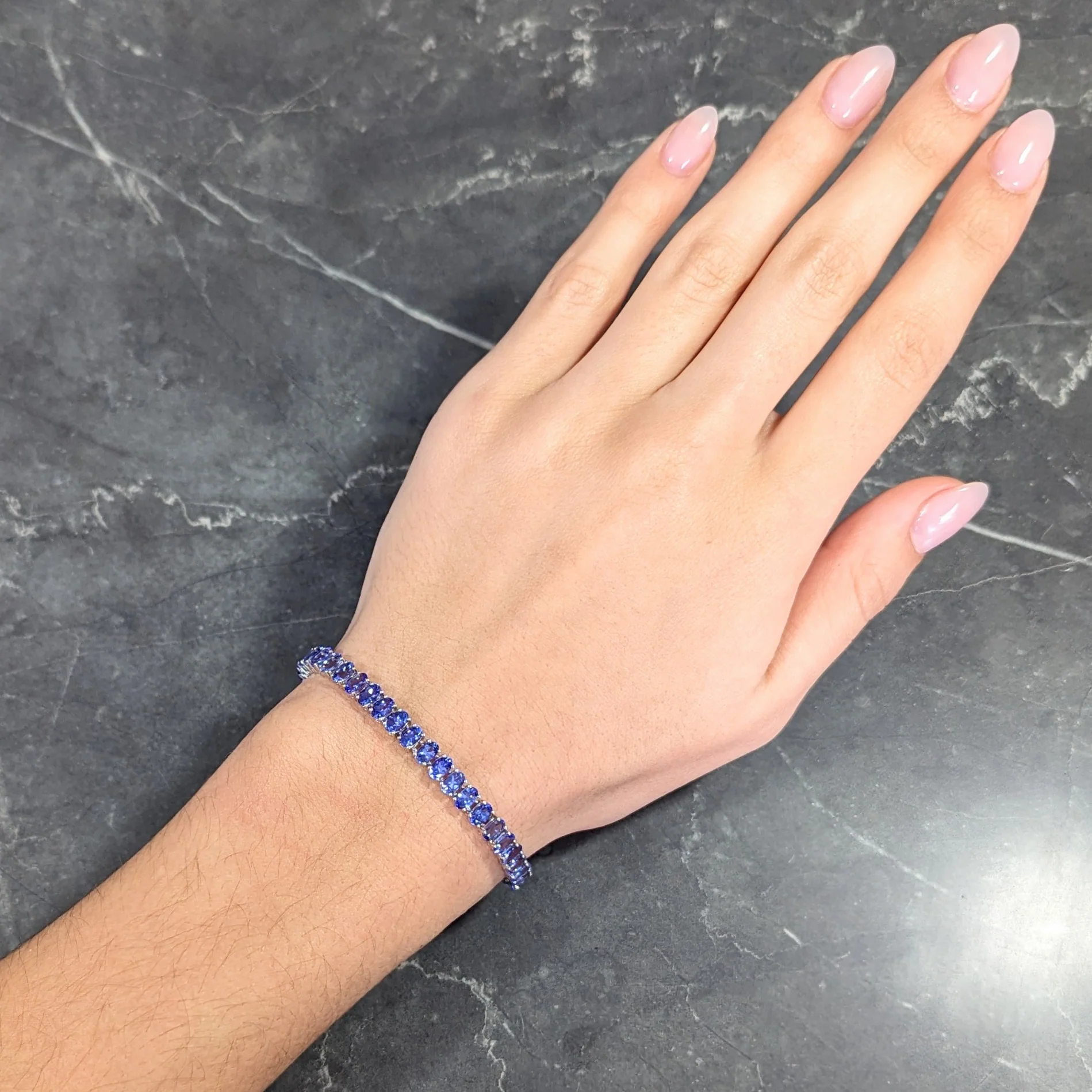 Contemporary 12.00 CTW Oval Cut Tanzanite 14 Karat White Gold Line Bracelet - Image 13