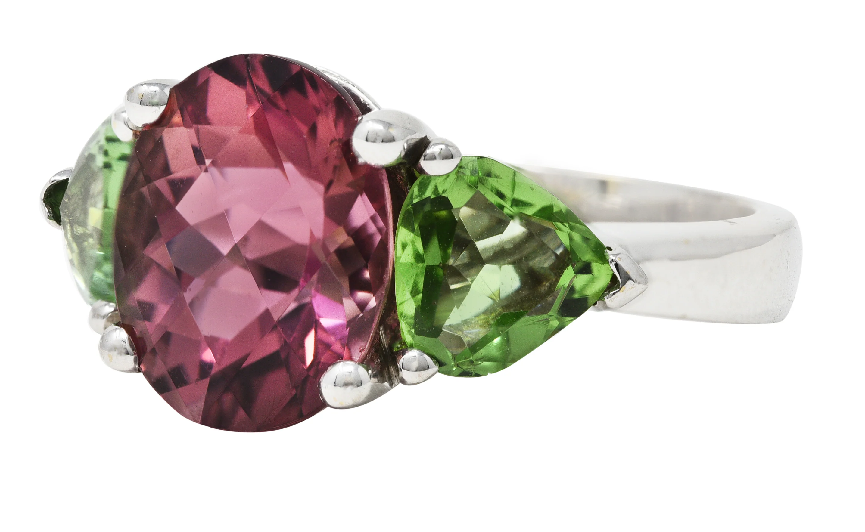 Contemporary 7.23 CTW Oval Cut Pink Tourmaline Peridot 18 Karat White Gold Three Stone Ring - Image 6