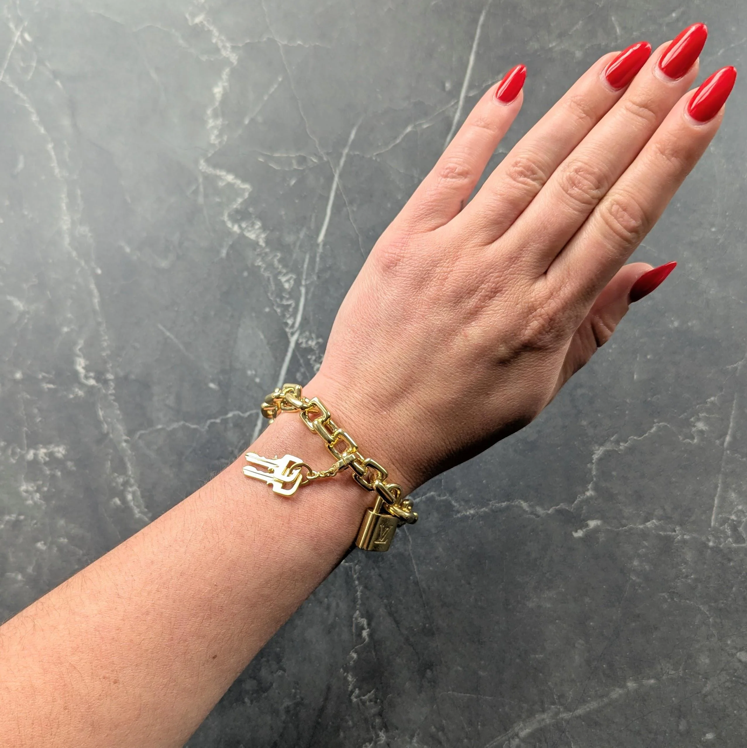 Louis Vuitton Paris Contemporary 18 Karat Yellow Gold Lock & Key Link Bracelet - Image 2