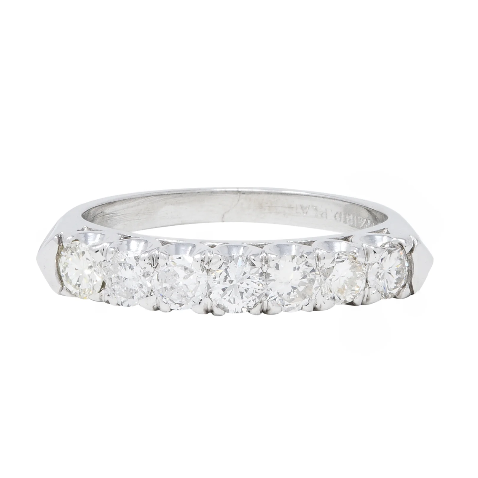 Mid-Century 0.70 CTW Diamond Platinum Seven Stone Vintage Fishtail Band Ring