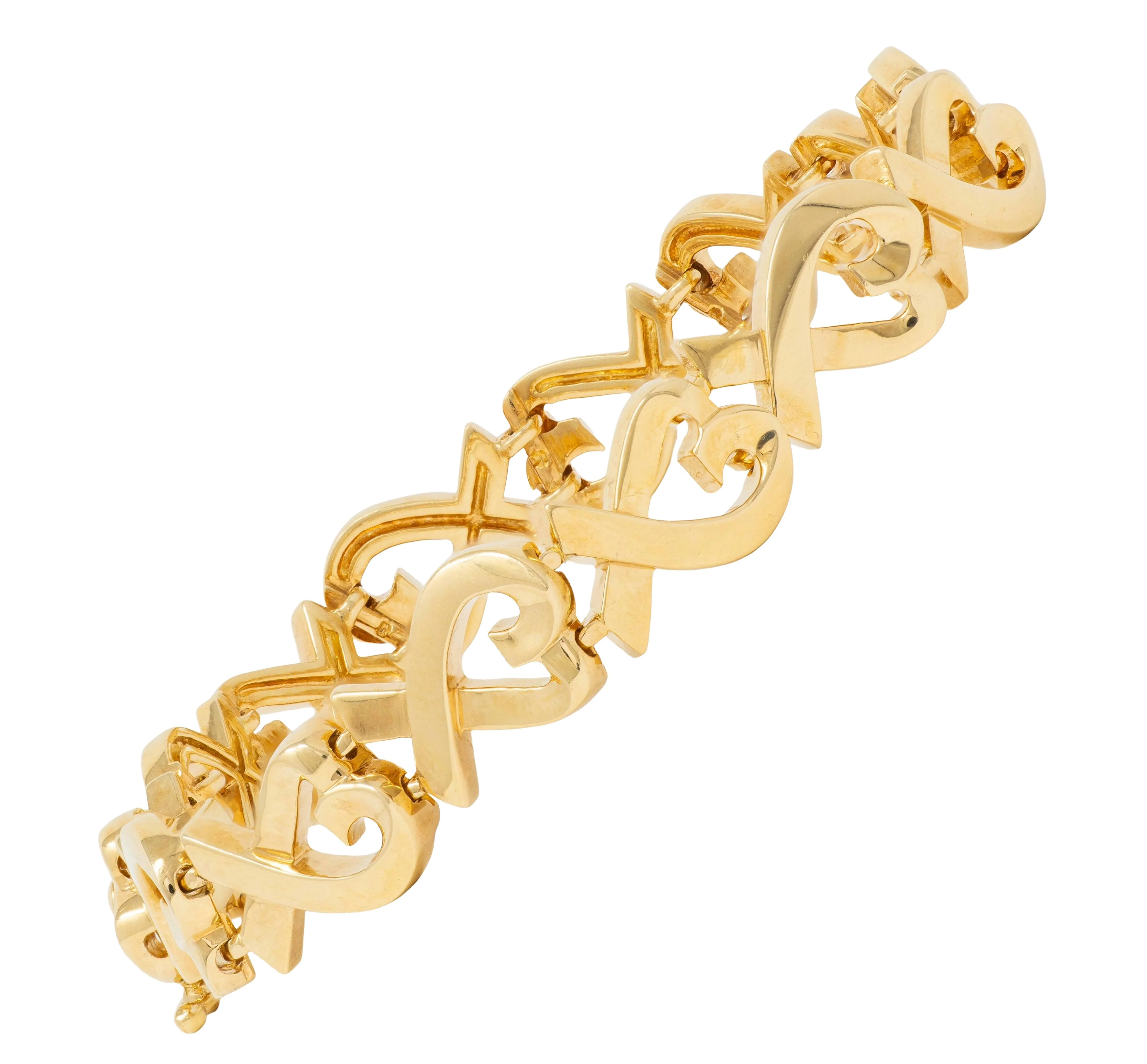 Tiffany & Co. Paloma Picasso 1980's 18 Karat Yellow Gold Vintage Loving Hearts Link Bracelet