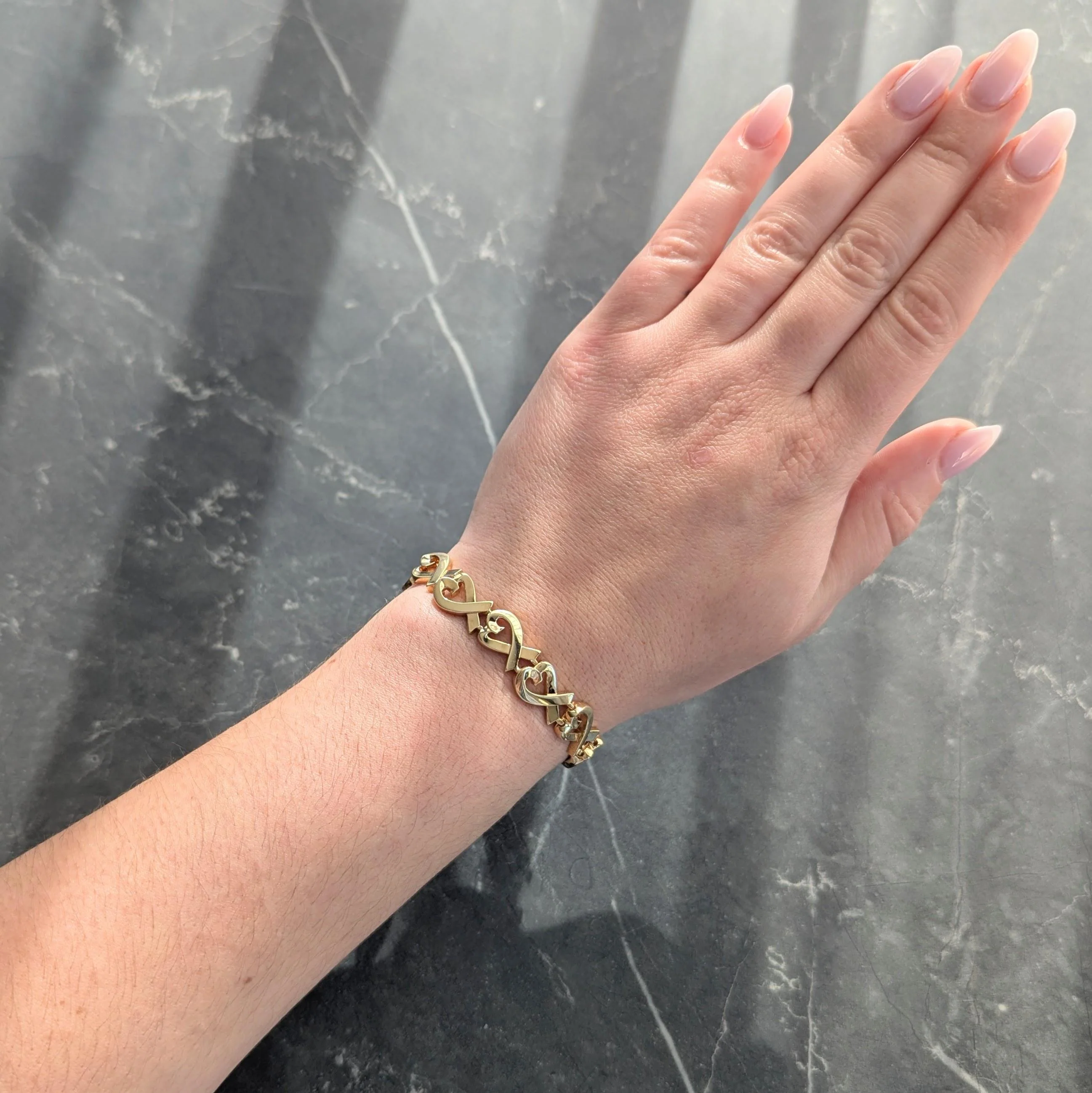 Tiffany & Co. Paloma Picasso 1980's 18 Karat Yellow Gold Vintage Loving Hearts Link Bracelet - Image 2